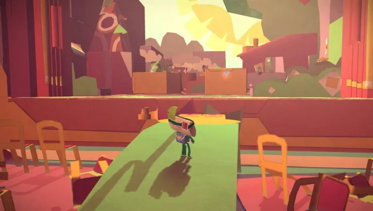 Une capture d'écran du jeu, le personnage principal devant un décors fait en papier carton